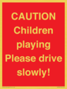 caution-children-playing-please-drive-slowly~